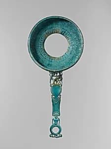 Bronze strainer with openwork handle by Unknown Artist