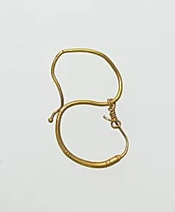 Earring, delta-shaped by Unknown Artist