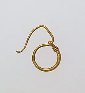 Earring, delta-shaped by Unknown Artist
