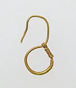 Earring, delta-shaped by Unknown Artist