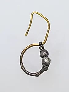 Earring, delta-shaped with beads by Unknown Artist