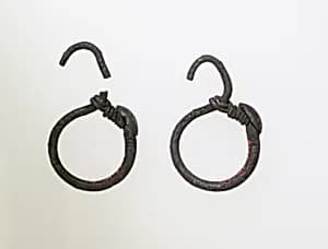 Earring, delta-shaped with disc by Unknown Artist