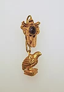 Earring with hawk pendant by Unknown Artist