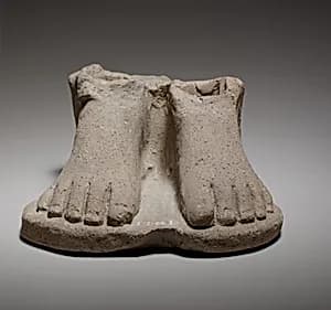 Feet on a plinth by Unknown Artist