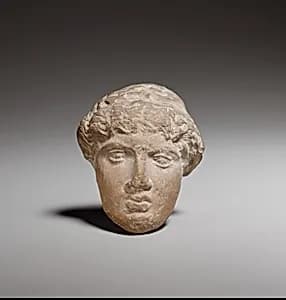 Female head by Unknown Artist