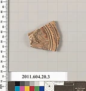 Fragment of a terracotta lamp  by Unknown Artist