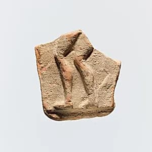 Fragment of a terracotta plaque by Unknown Artist