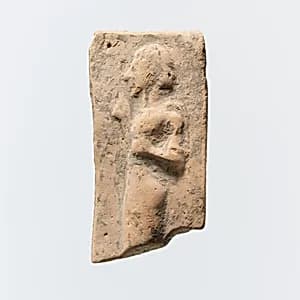 Fragment of a terracotta plaque by Unknown Artist