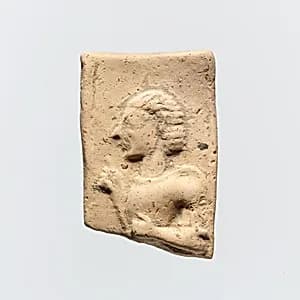Fragment of a terracotta plaque by Unknown Artist
