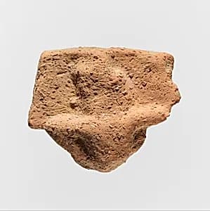 Fragment of a terracotta plaque by Unknown Artist
