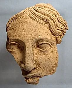 Fragmentary terracotta female head by Unknown Artist