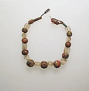 Glass and rock crystal beads by Unknown Artist