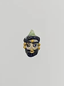 Glass double head pendant by Unknown Artist