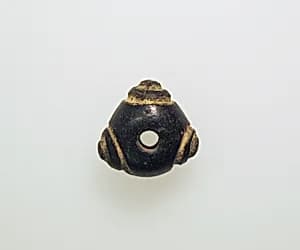 Glass eye bead by Unknown Artist