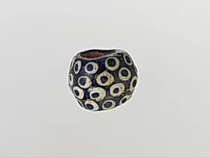 Glass eye bead by Unknown Artist