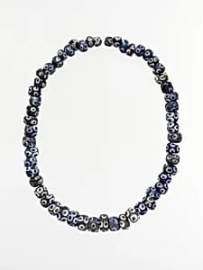 Glass eye beads by Unknown Artist