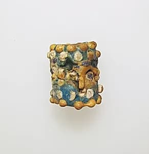 Glass face bead by Unknown Artist