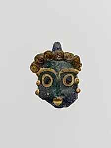 Glass head pendant by Unknown Artist