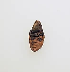Glass head pendant by Unknown Artist