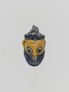 Glass head pendant by Unknown Artist