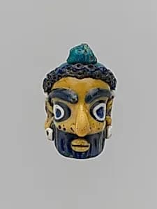 Glass head pendant by Unknown Artist