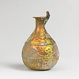 Glass hunt-and-scroll bottle by Unknown Artist