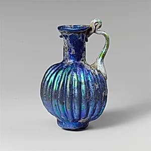 Glass juglet with vertical ribbing by Unknown Artist