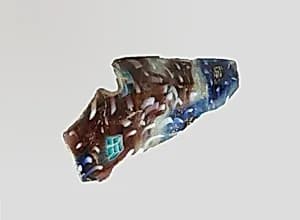 Glass mosaic ribbed bowl fragment by Unknown Artist