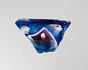 Glass mosaic ribbed bowl fragment by Unknown Artist