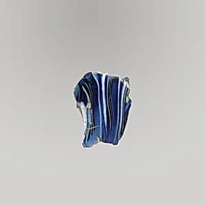 Glass mosaic ribbed bowl fragment by Unknown Artist