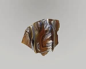 Glass mosaic ribbed bowl fragment by Unknown Artist
