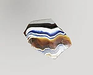 Glass mosaic ribbed bowl fragment by Unknown Artist