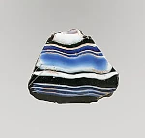 Glass mosaic ribbed bowl fragment by Unknown Artist