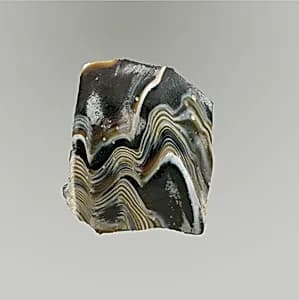 Glass mosaic ribbed bowl fragment by Unknown Artist