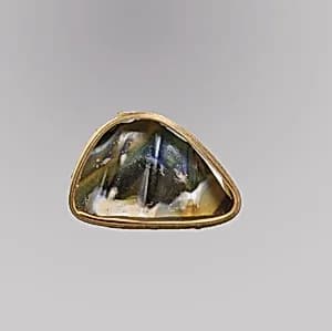 Glass mosaic ribbed bowl fragment by Unknown Artist