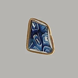 Glass mosaic ribbed bowl fragment by Unknown Artist