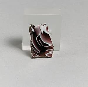 Glass mosaic ribbed bowl fragment by Unknown Artist