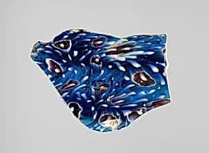 Glass mosaic ribbed bowl fragment by Unknown Artist