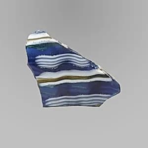 Glass mosaic ribbed bowl fragment by Unknown Artist