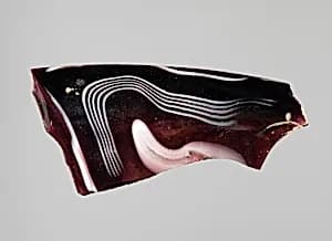 Glass mosaic ribbed bowl fragment by Unknown Artist
