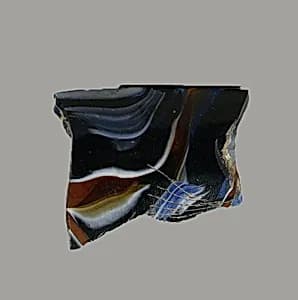 Glass mosaic ribbed bowl fragment by Unknown Artist