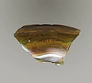 Glass mosaic ribbed bowl fragment by Unknown Artist
