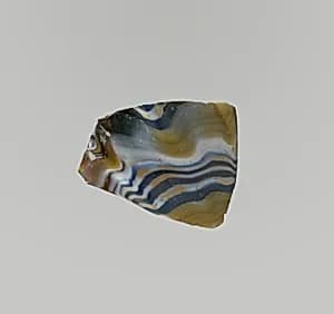 Glass mosaic ribbed bowl fragment by Unknown Artist