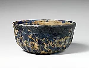 Glass ribbed bowl by Unknown Artist