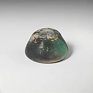 Glass spindle whorl by Unknown Artist