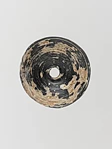 Glass spindle whorl by Unknown Artist