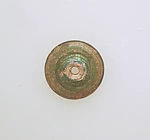 Glass spindle whorl by Unknown Artist