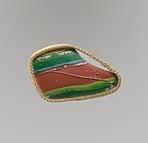 Glass striped mosaic bowl fragment by Unknown Artist