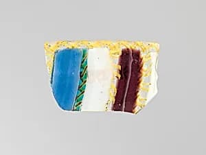 Glass striped mosaic bowl fragment by Unknown Artist