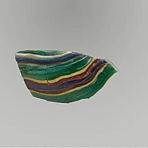 Glass striped mosaic bowl fragment by Unknown Artist